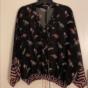 Express top. Black with pink and salmon florals.